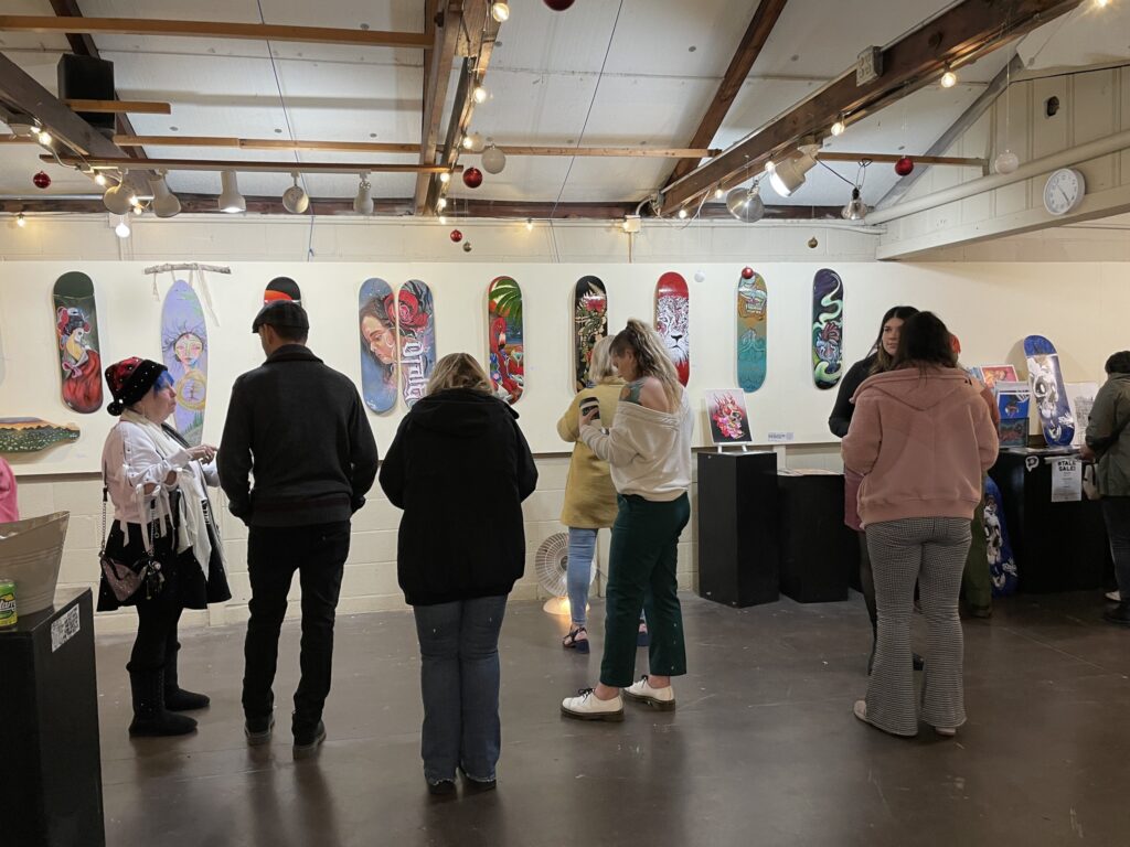 Guests viewing artwork in the Art Studio gallery